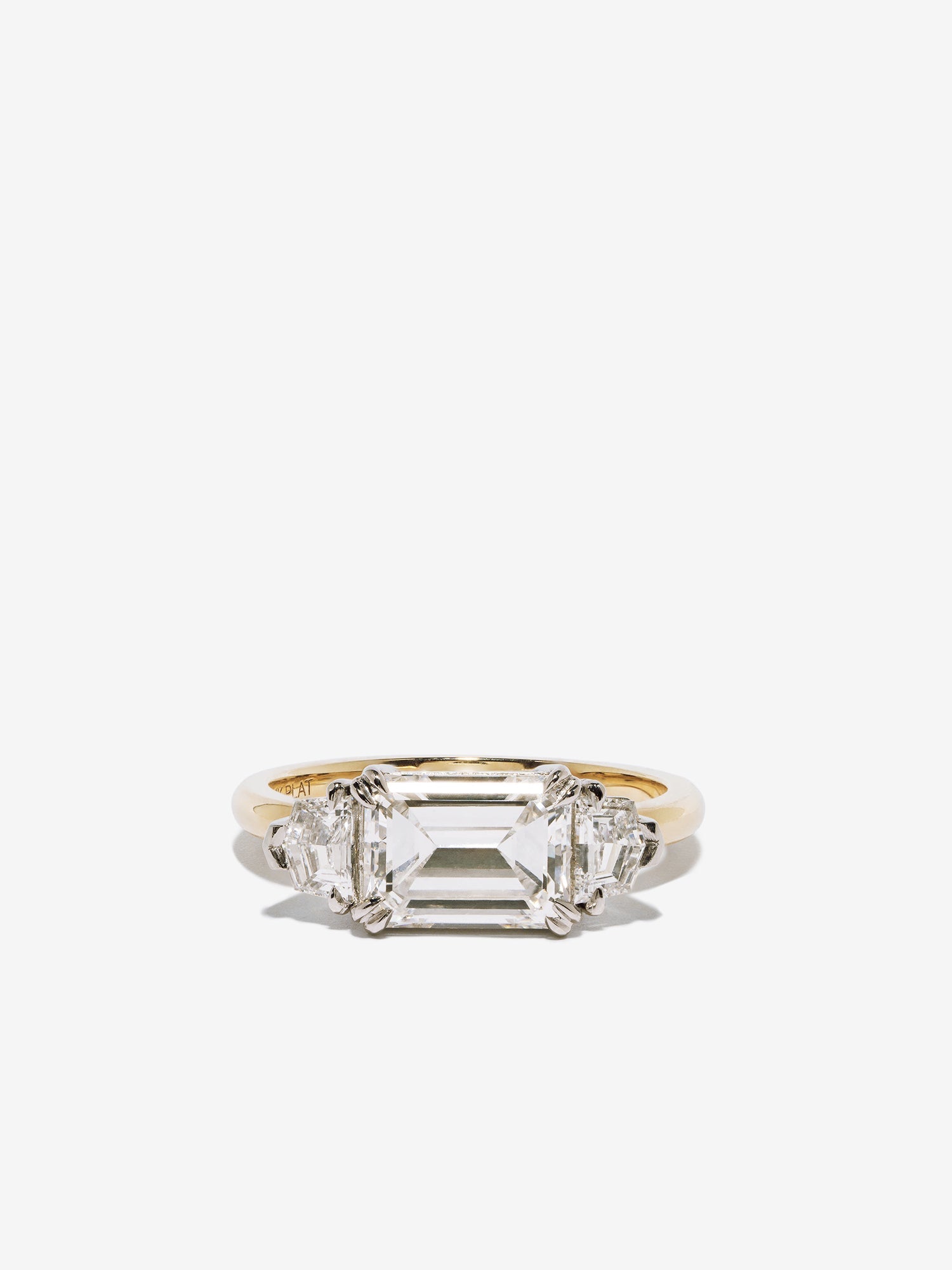 Emerald Cut & Cadillac Diamond Ring
